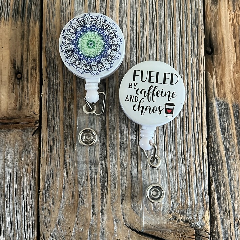 Two NWOT retractable badge holders